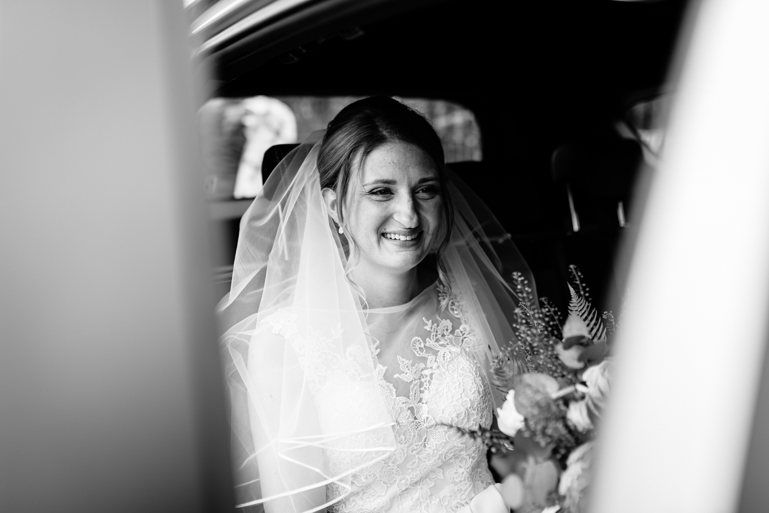 Bride in car arriving at church