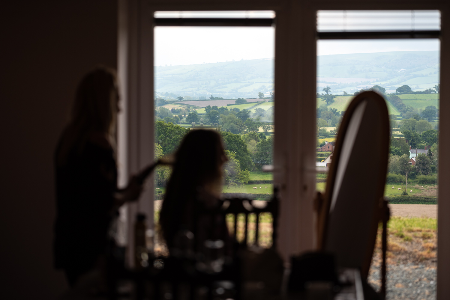 View out of window during bridal preparation