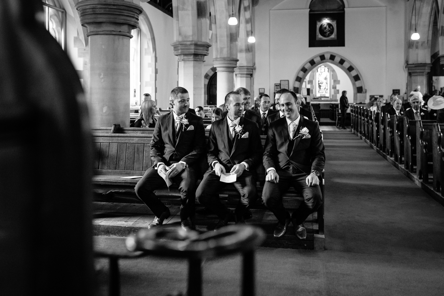 Groom waiting in church