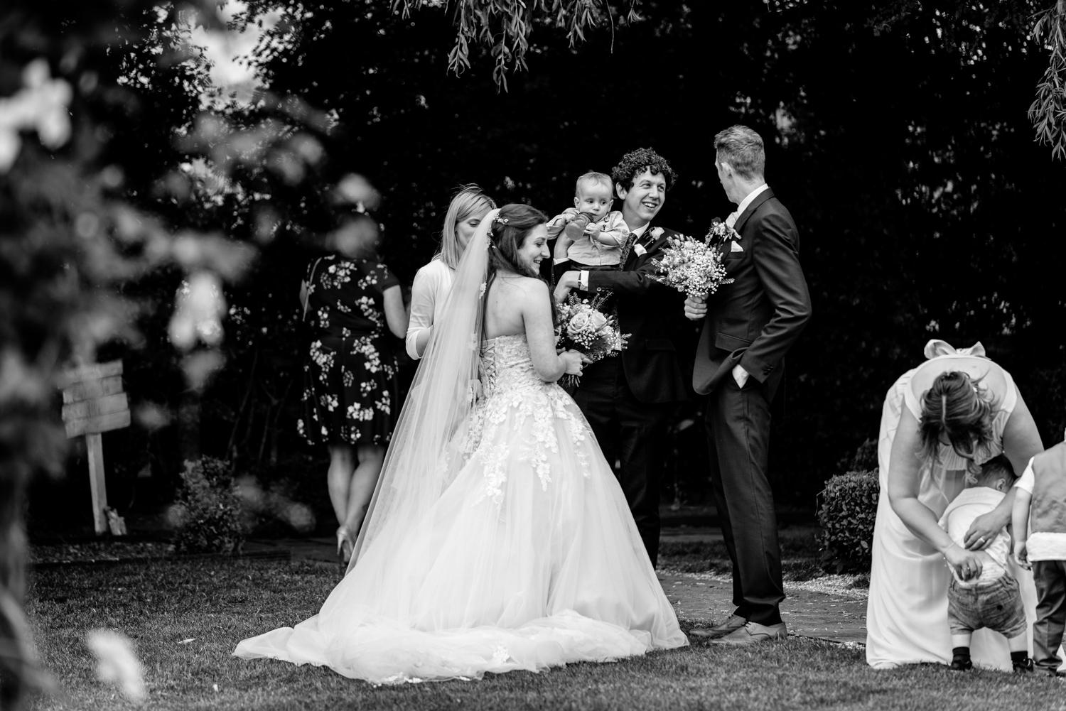 Wedding guests laughing