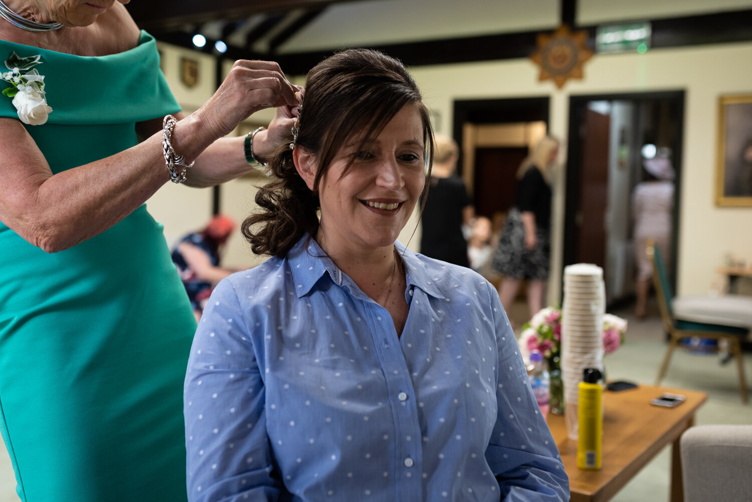 Bride having hair done