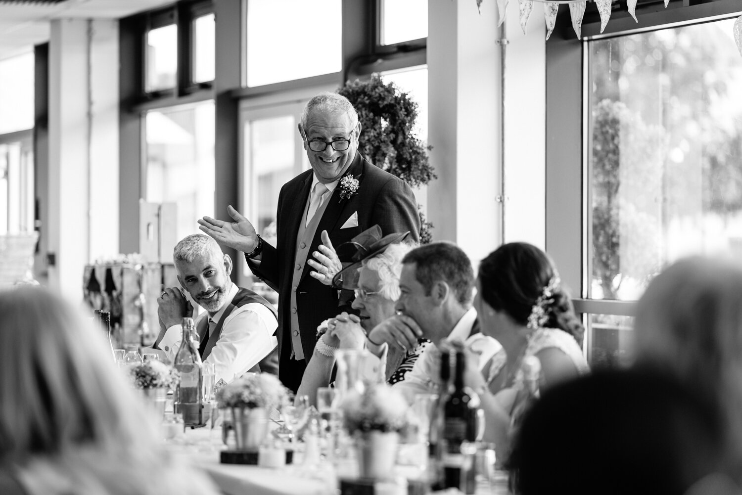 Father looking at daughter during speeches 