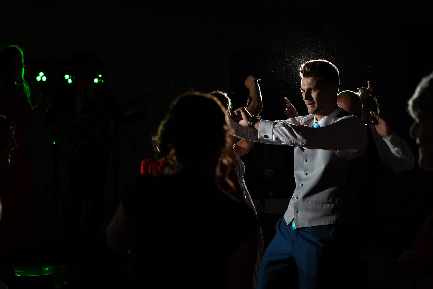Wedding guest dancing at wedding