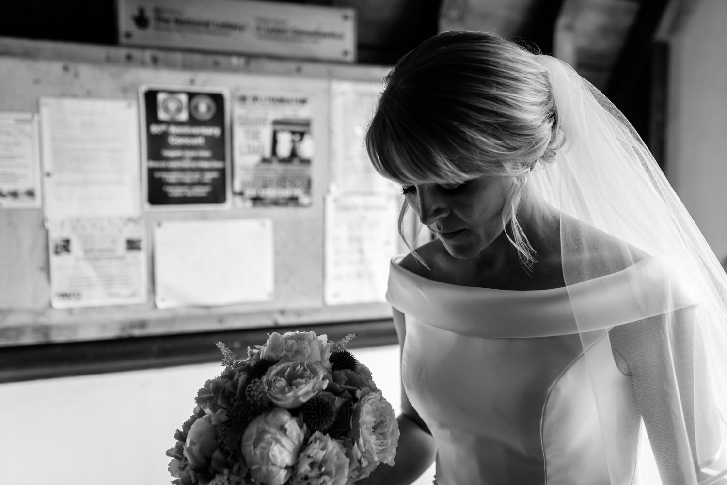 Bride waiting in church doorway