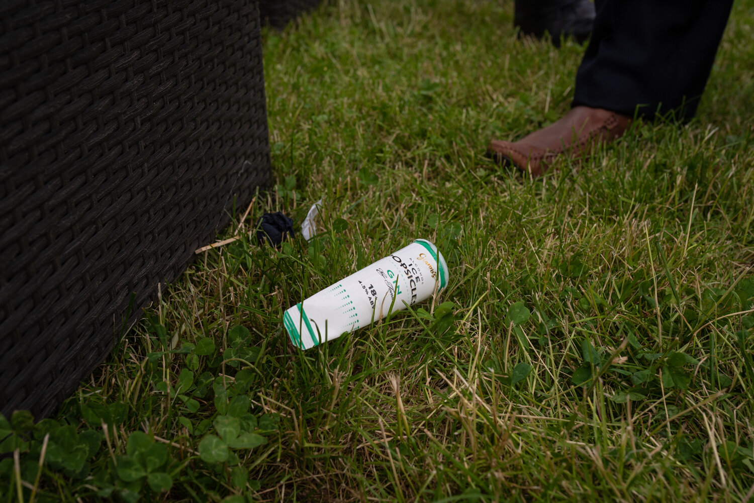 Ice cream wrapper on floor at summer wedding