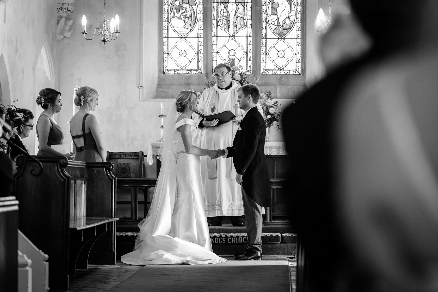 Bride and groom in church during powys wedding