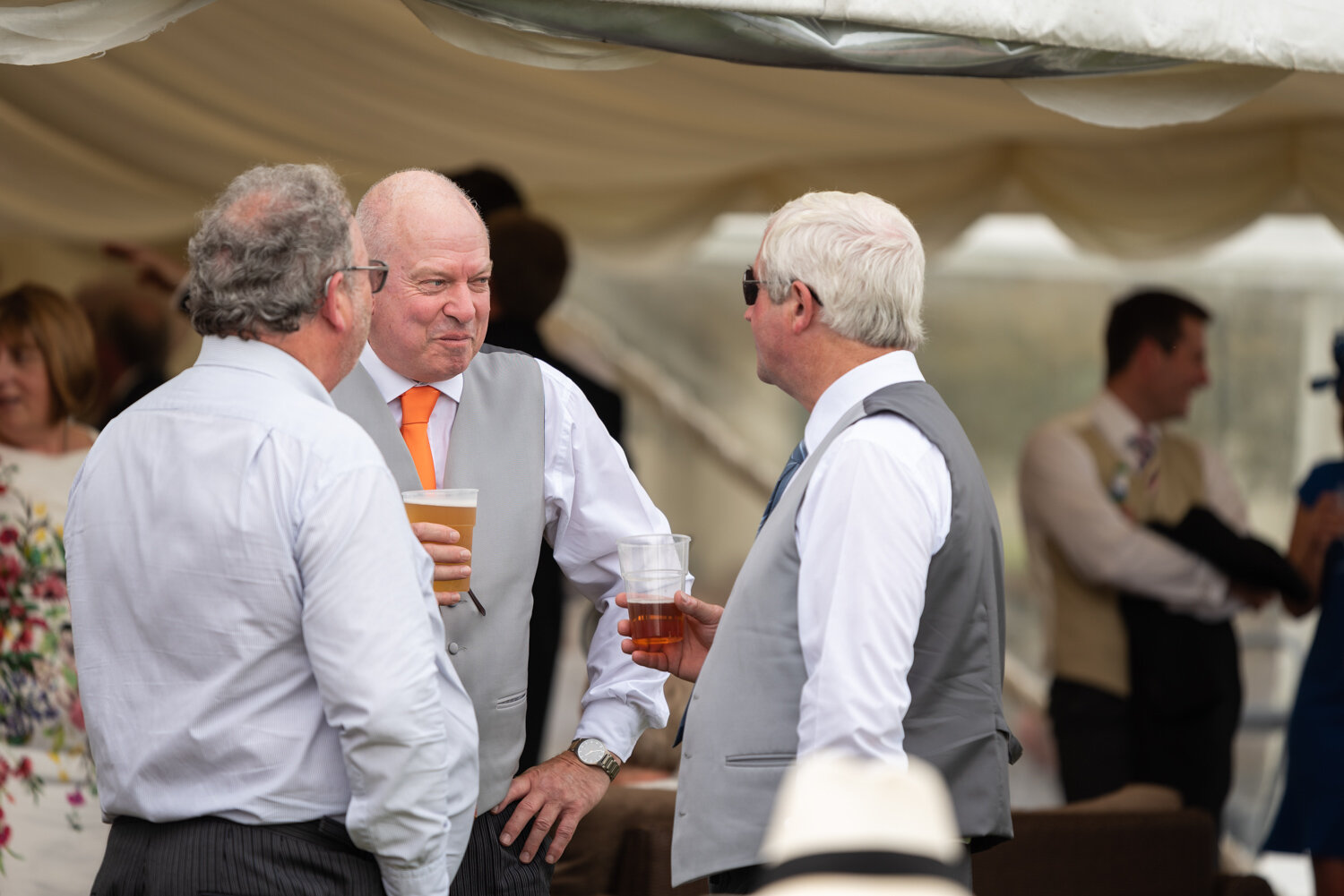 Guests laughing during Powys wedding