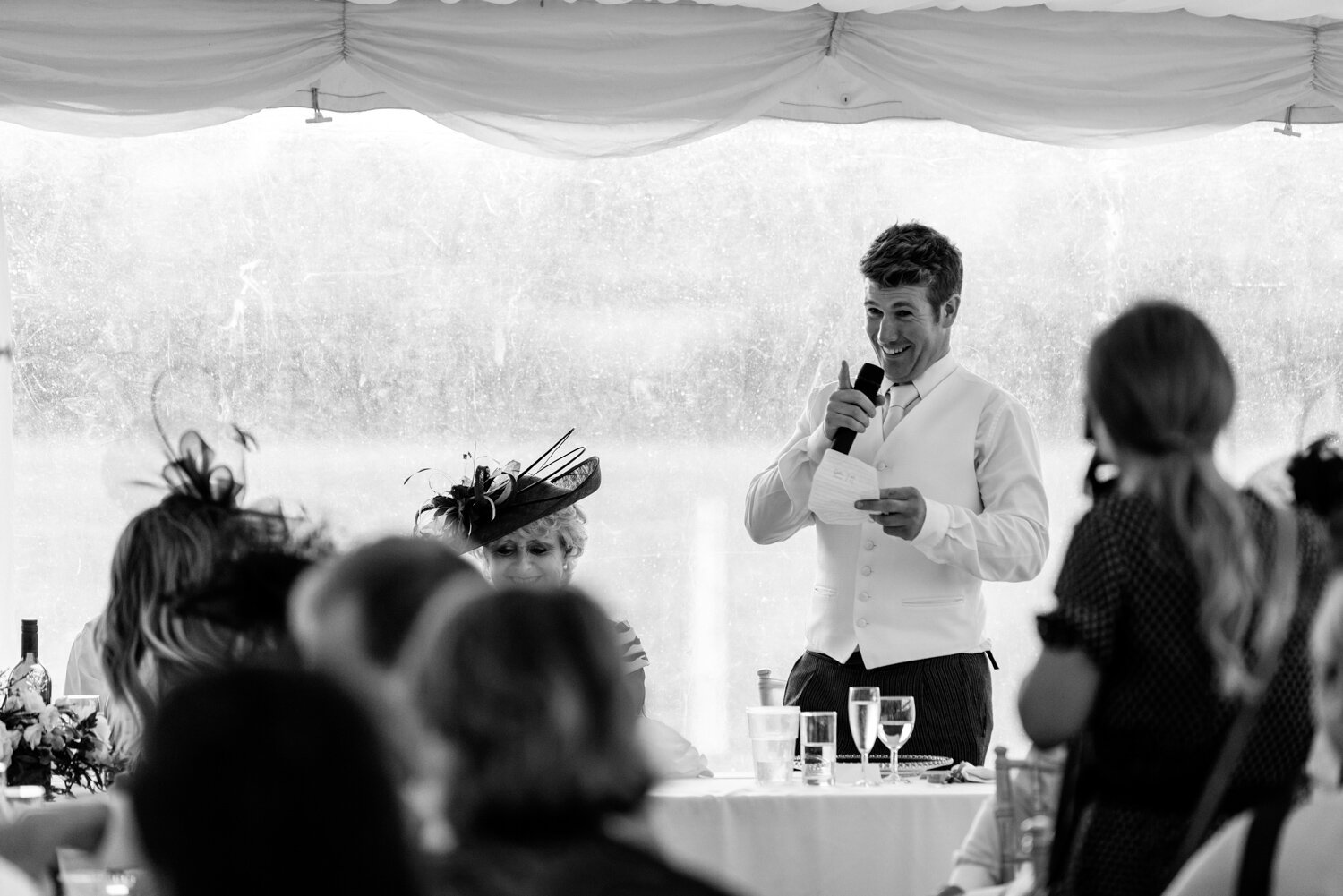 Master of ceremonies during speeches at Powys wedding