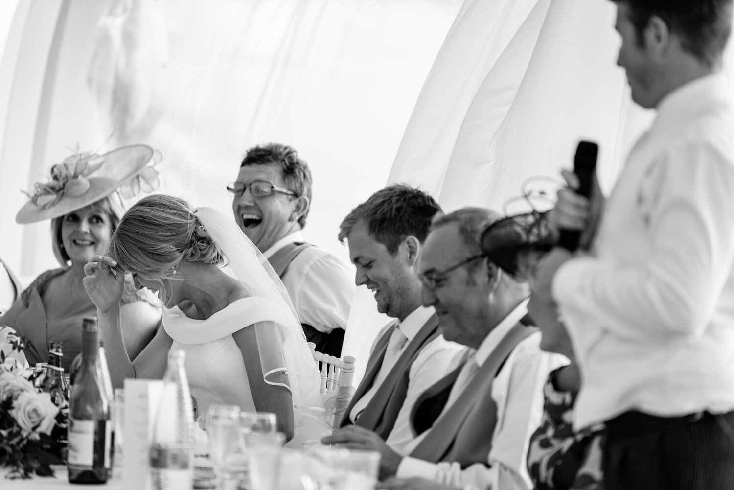 Laughter during Sam & Will's Powys wedding
