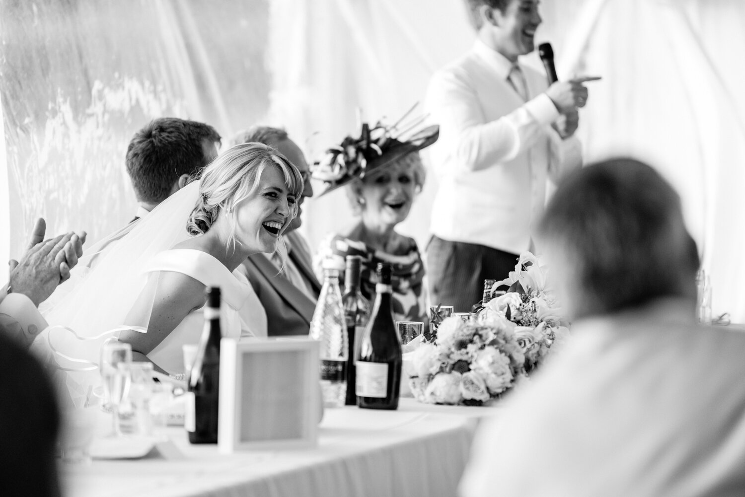 Bride laughing at speech