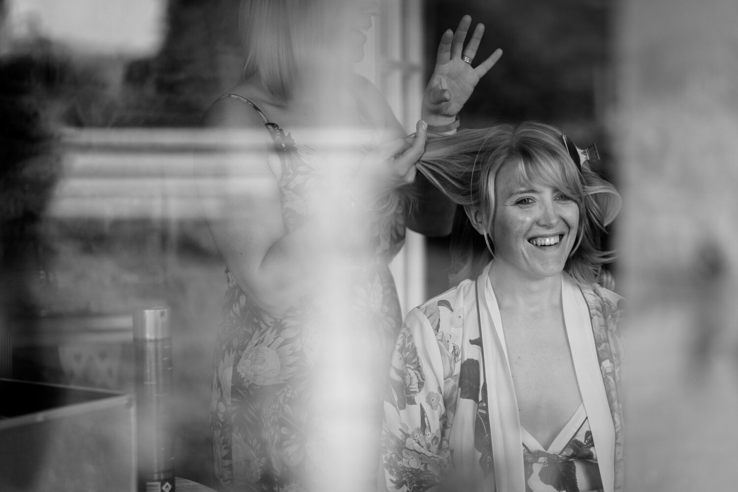 A smiling Sam during her bridal preparation