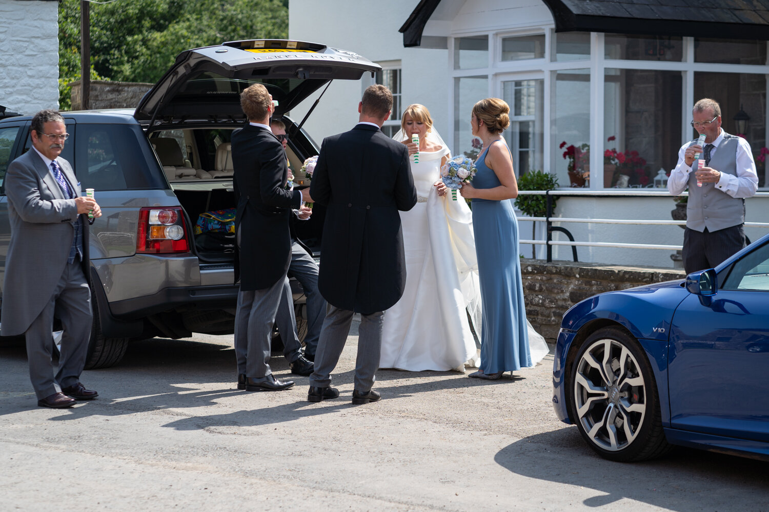 Bridal party eating ice-creams at Powys wedding