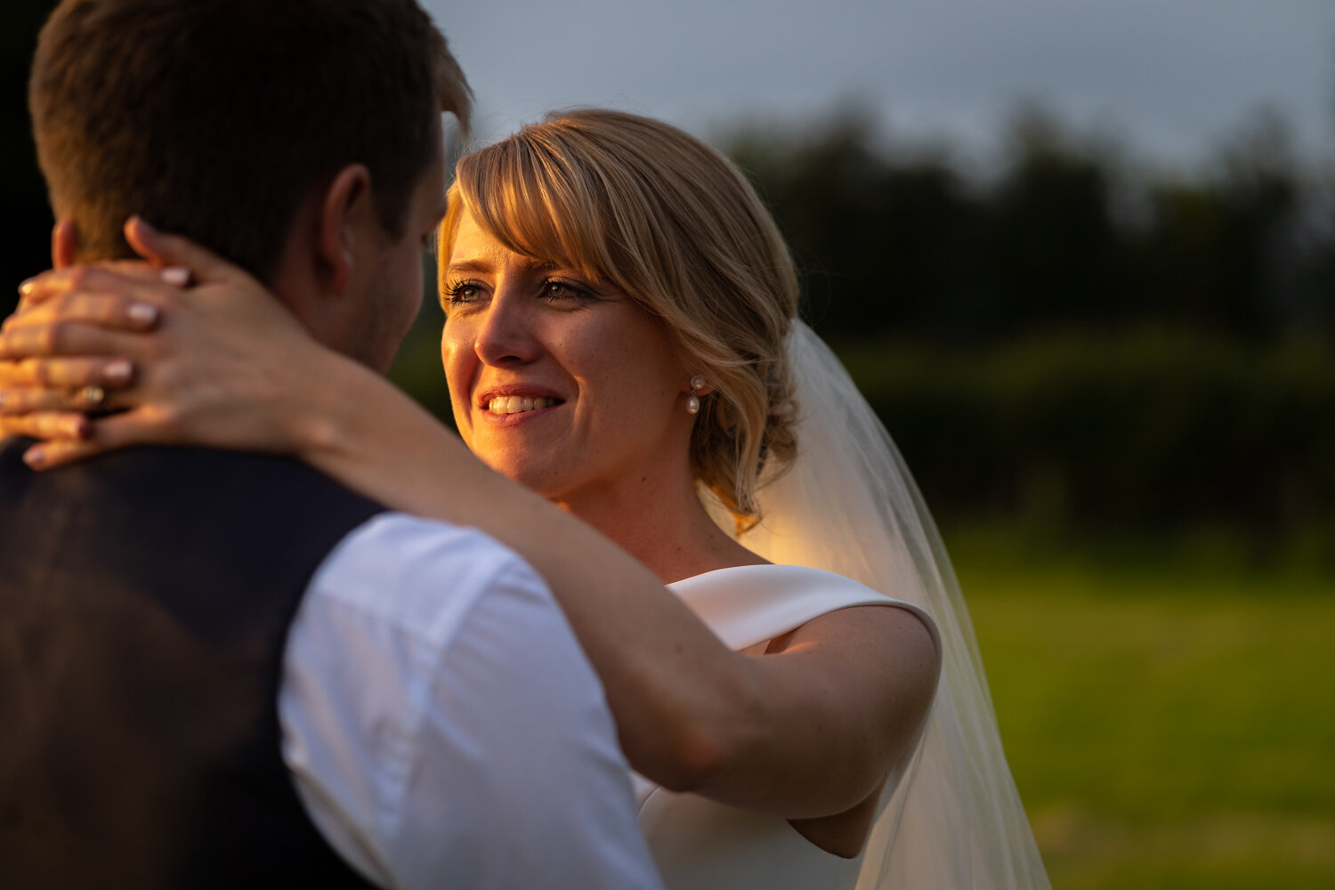 Bride looking at groom at Breconshire wedding