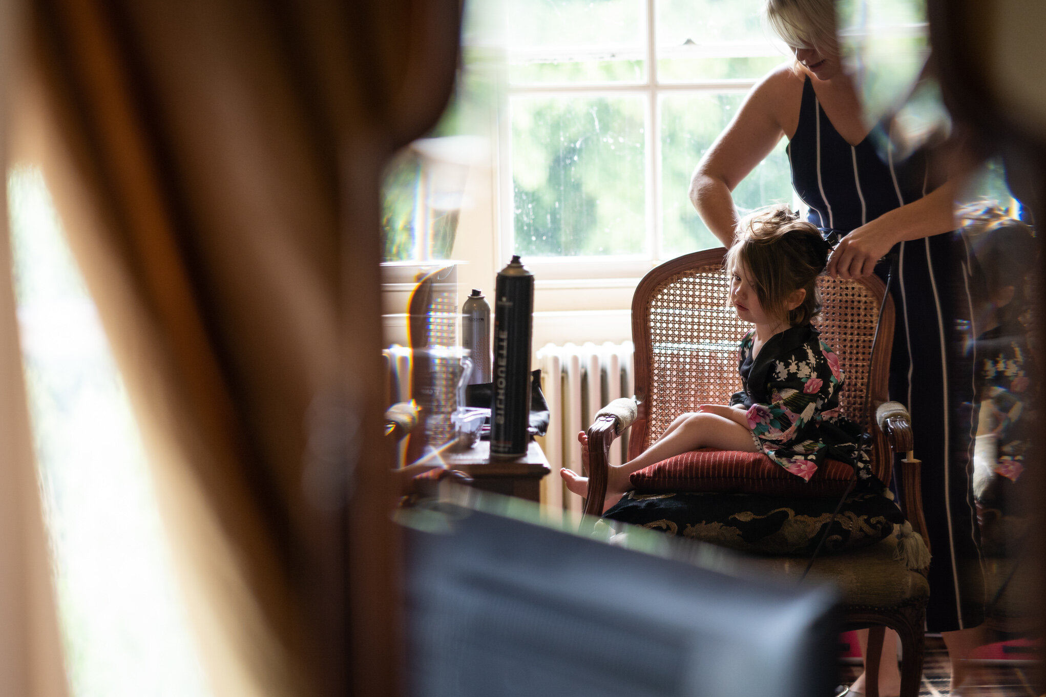 Flower girl sat in chair