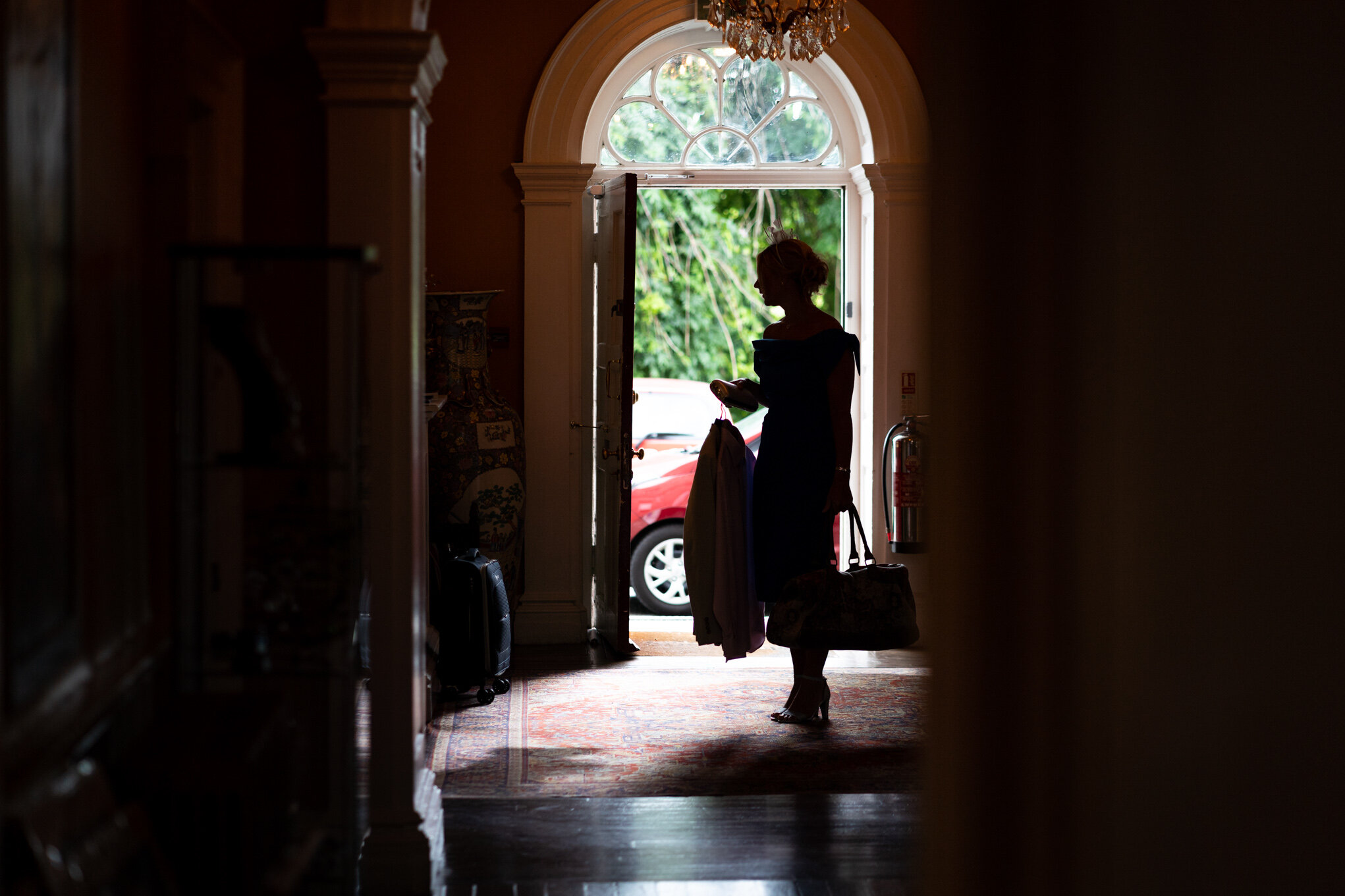 Silhouette of wedding guest arriving at Peterstone Court