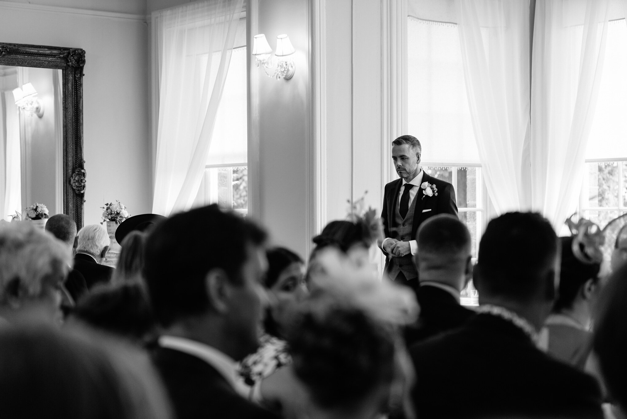 Groom waiting for bride at Peterstone Court