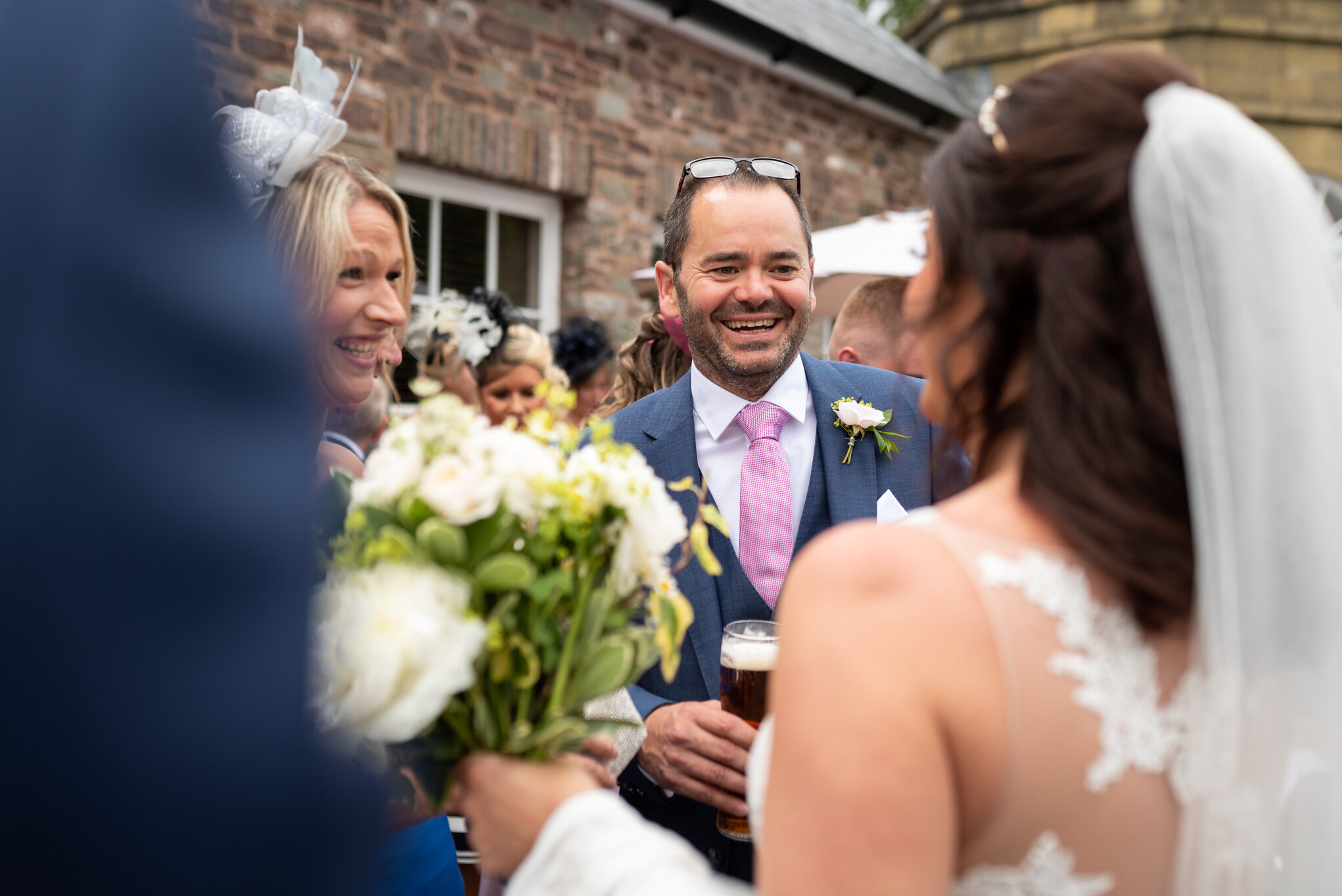 Wedding guest laughing