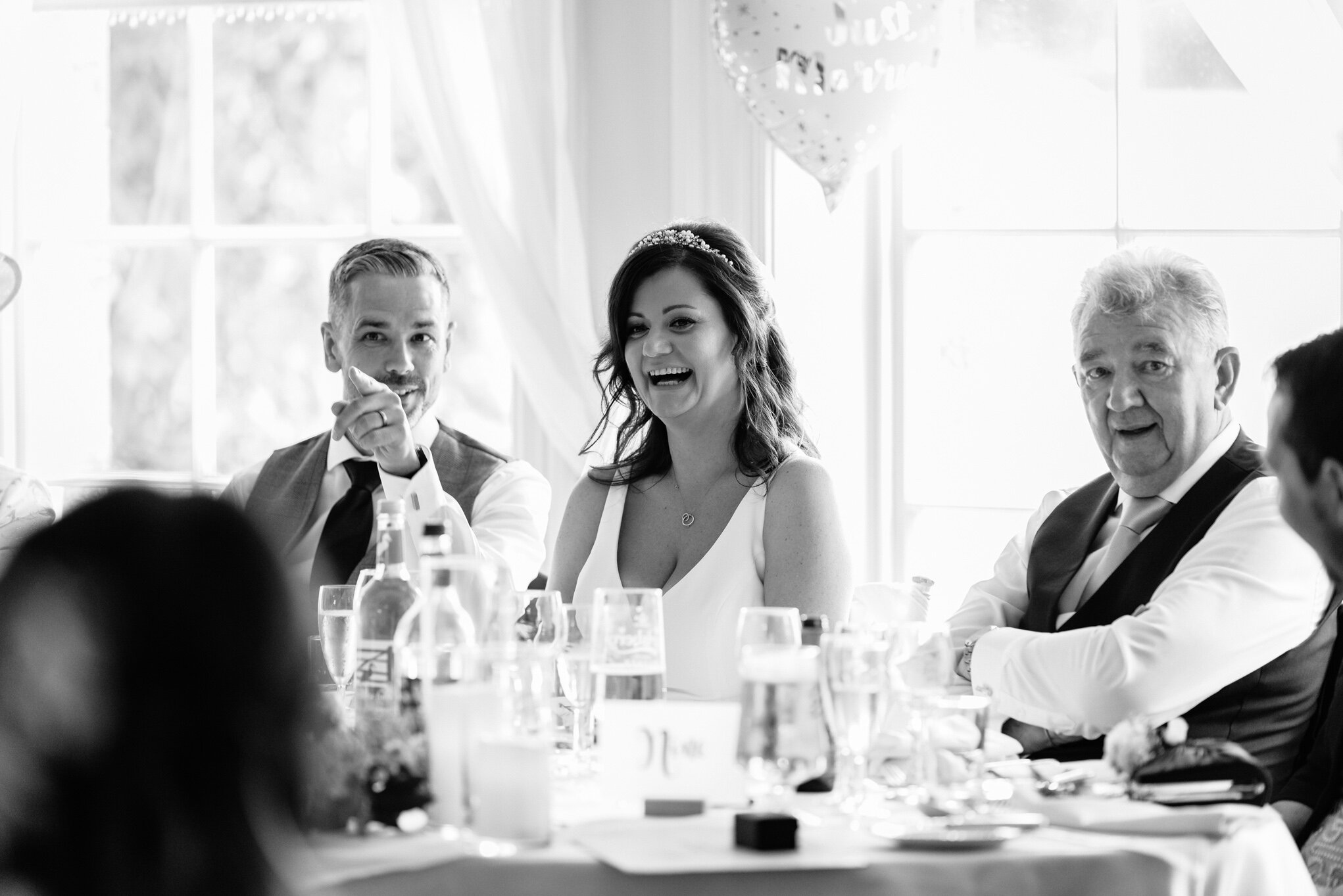 Groom pointing during speeches