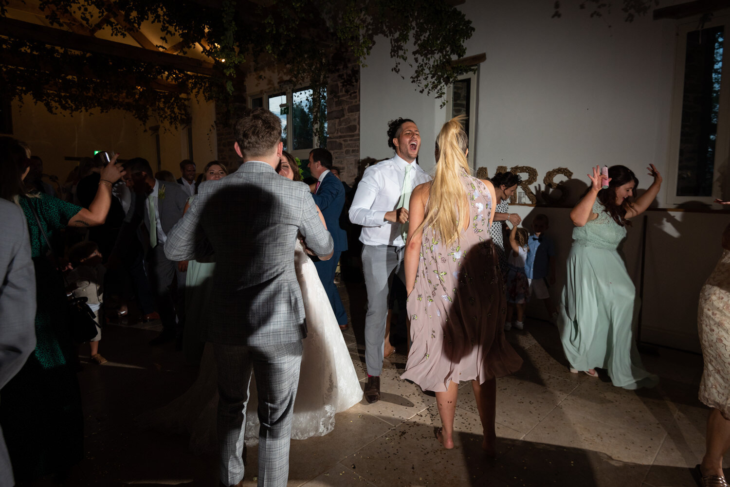 Wedding guests dancing at Tall John's House