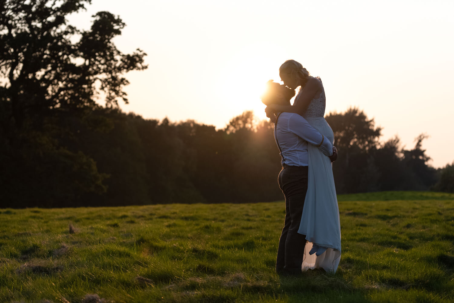 Bride &amp; groom sunset portrait at Cheshire wedding