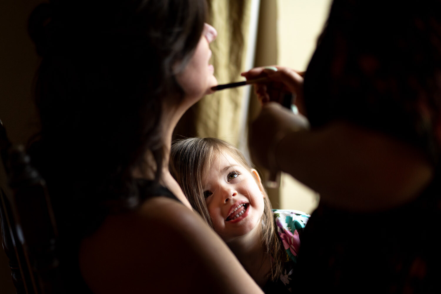 Brides daughter during bridal prep