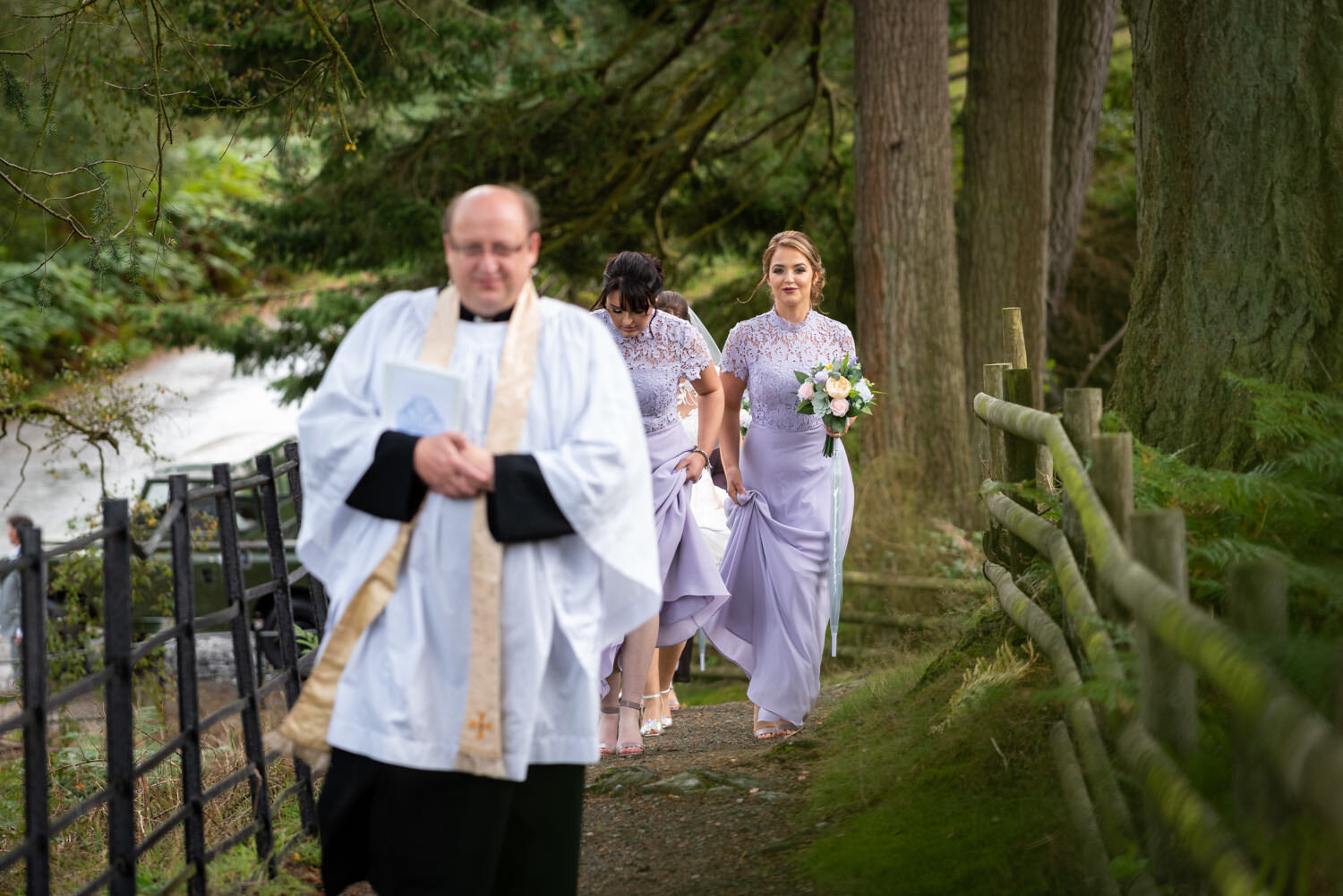 Bridesmaid walking to Elan Valley Church