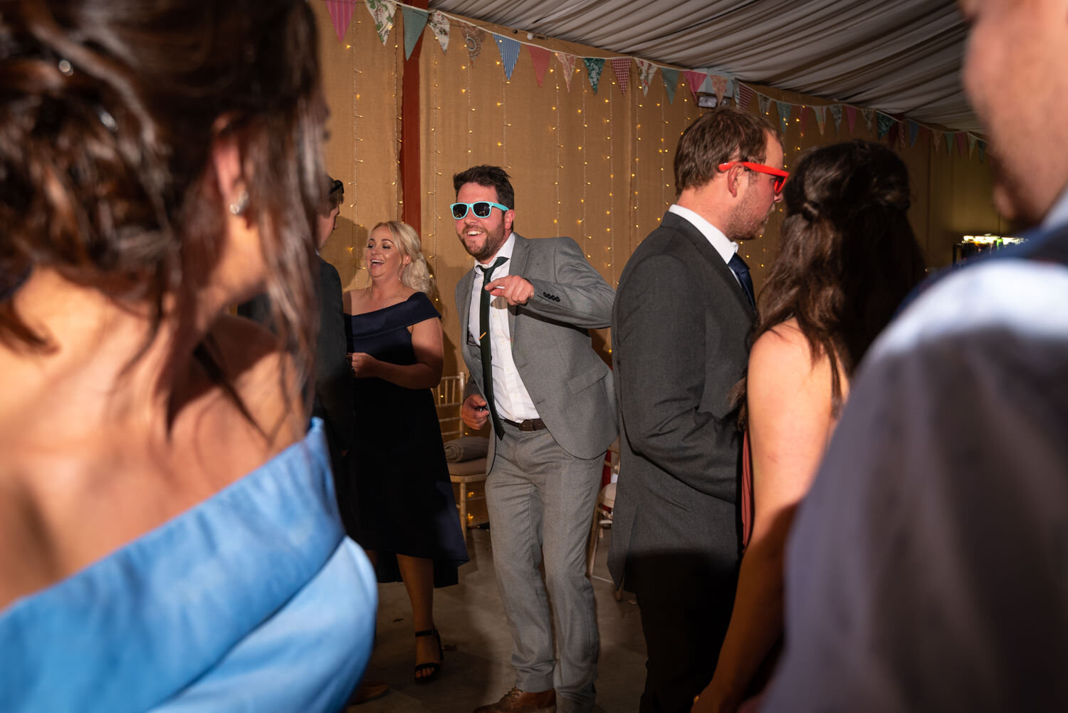 Guests dancing at Glyngynwydd Wedding Barn wedding party