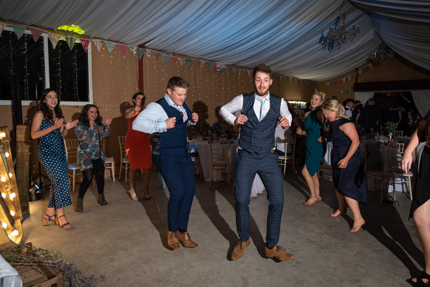 Dancing guests at Glyngynwydd Wedding Barn party