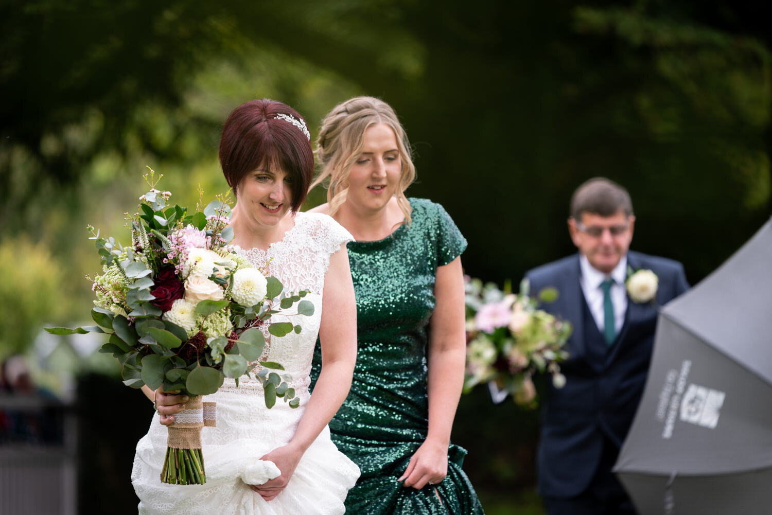 Bride and Bridesmaid walking to church