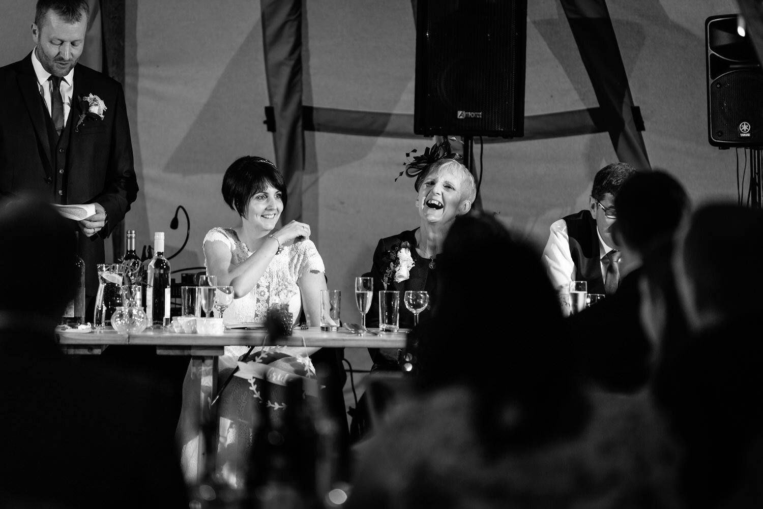 Mother of bride laughing at wedding speeches in mid wales