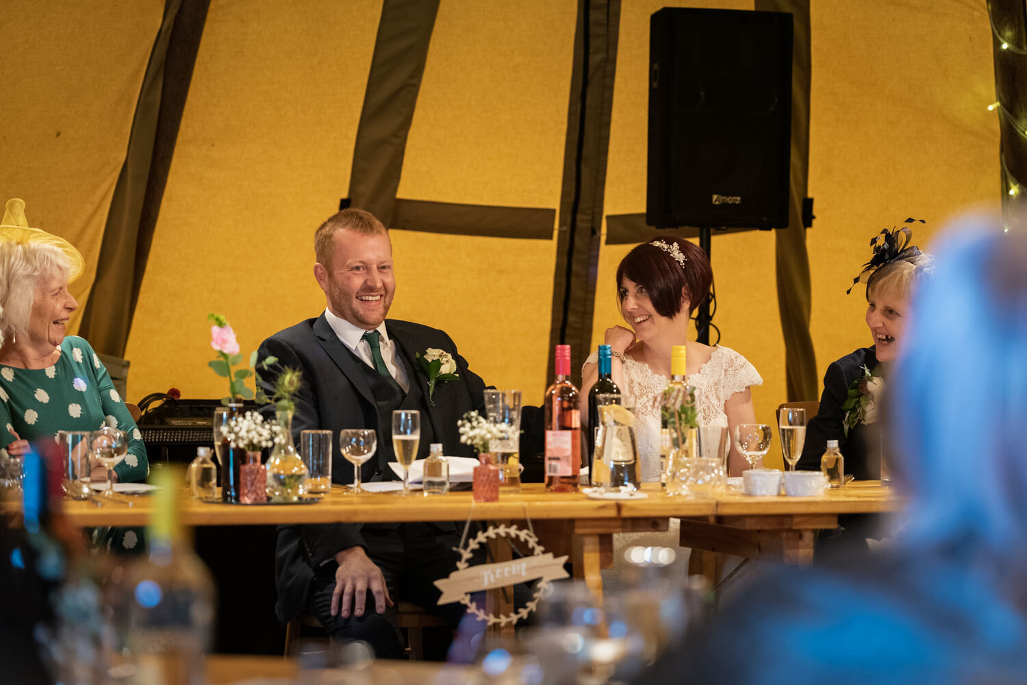 Bride and groom laughing during powys wedding