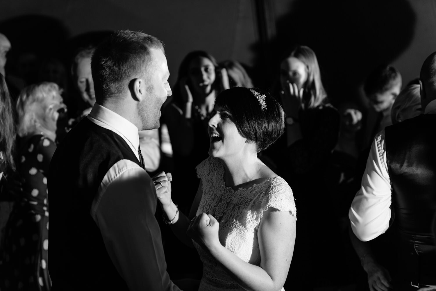 Bride dancing with groom