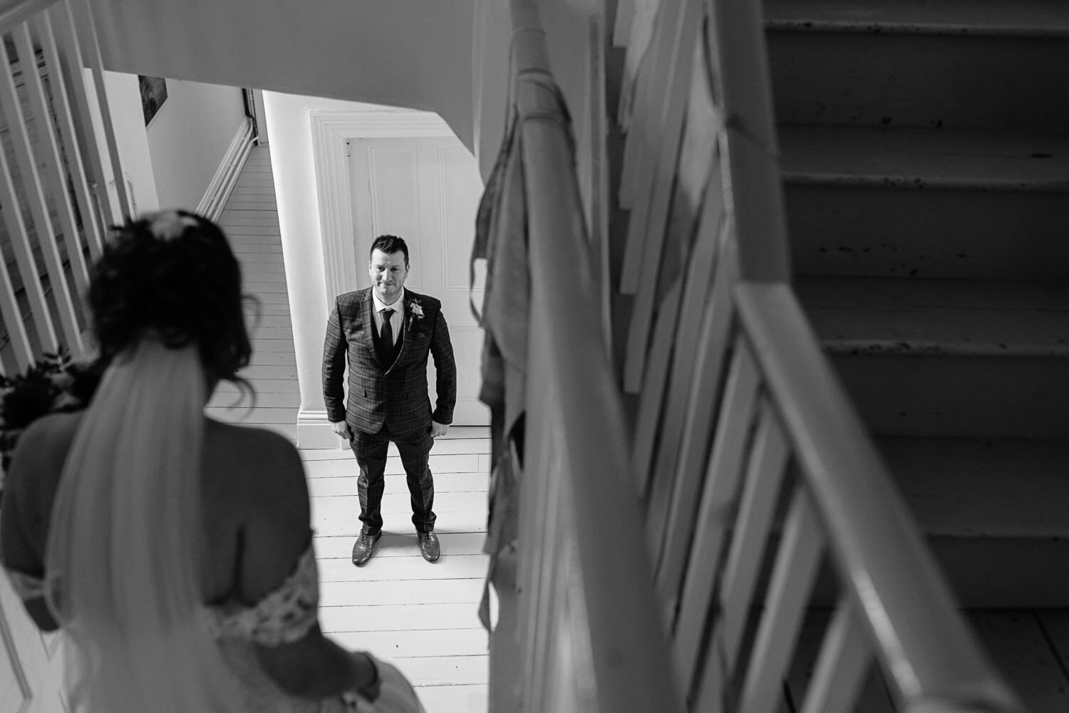 Groom looking at Bride