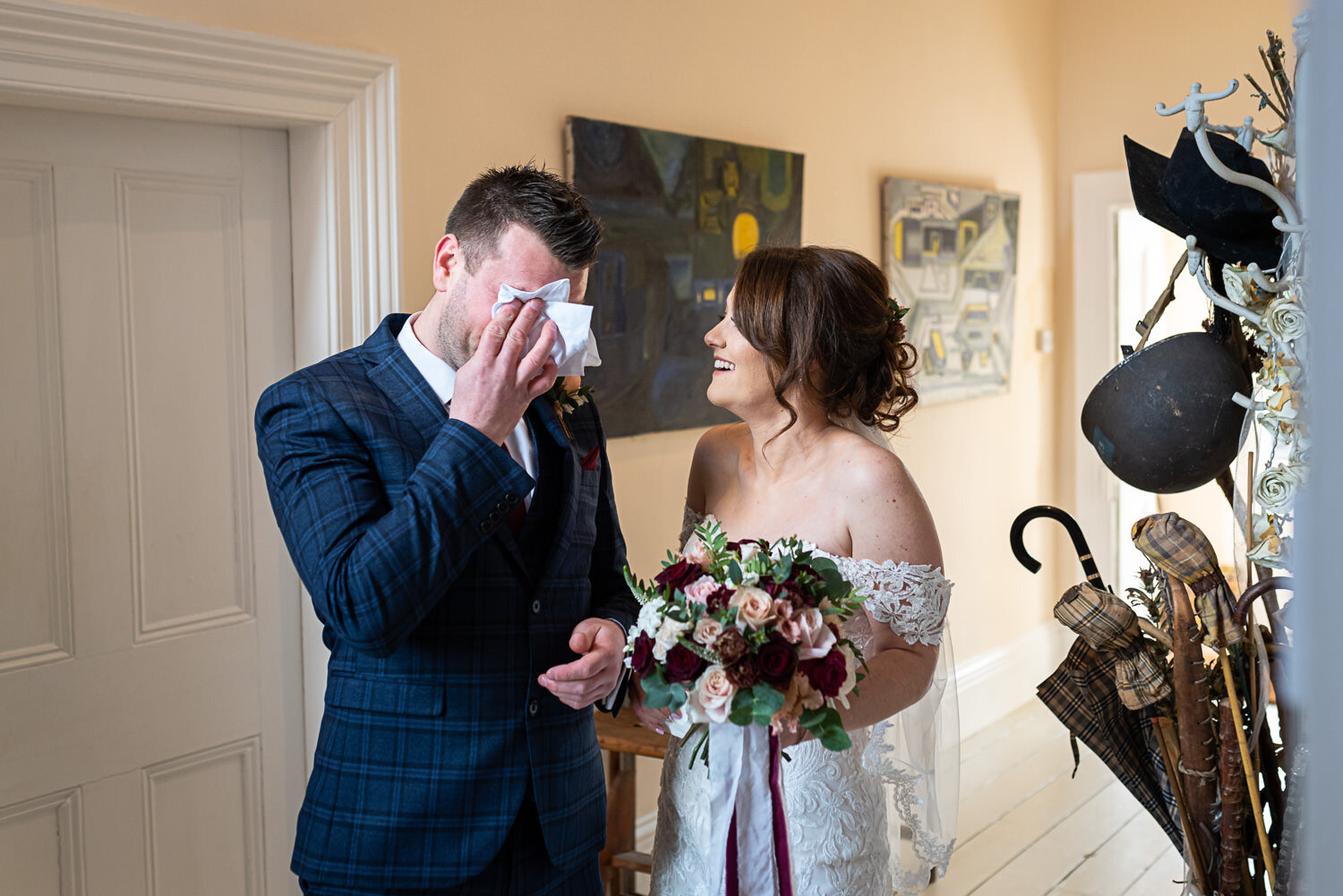 Groom crying with Bride at Lyde Court