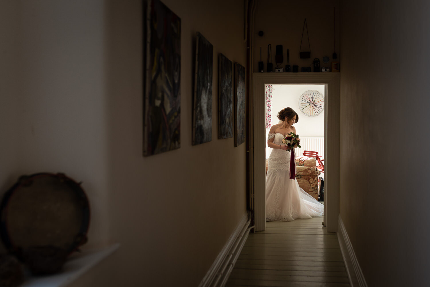 Bride making way to ceremony at Lyde Court wedding