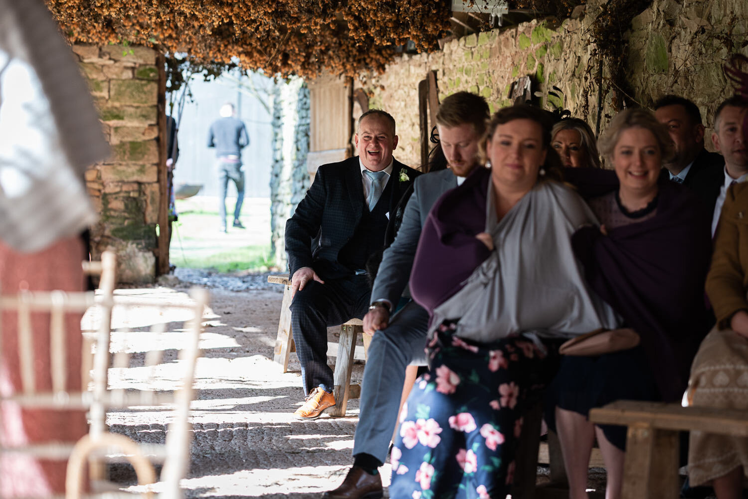 Best man laughing before Lyde Court wedding