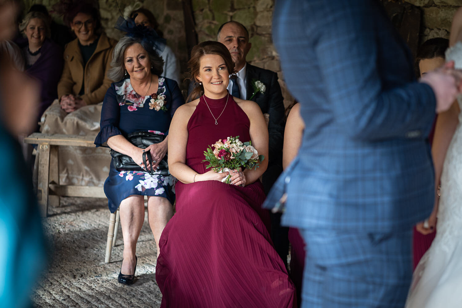 Smiling bridesmaid at Ebony &amp; Tref's Lyde Court wedding