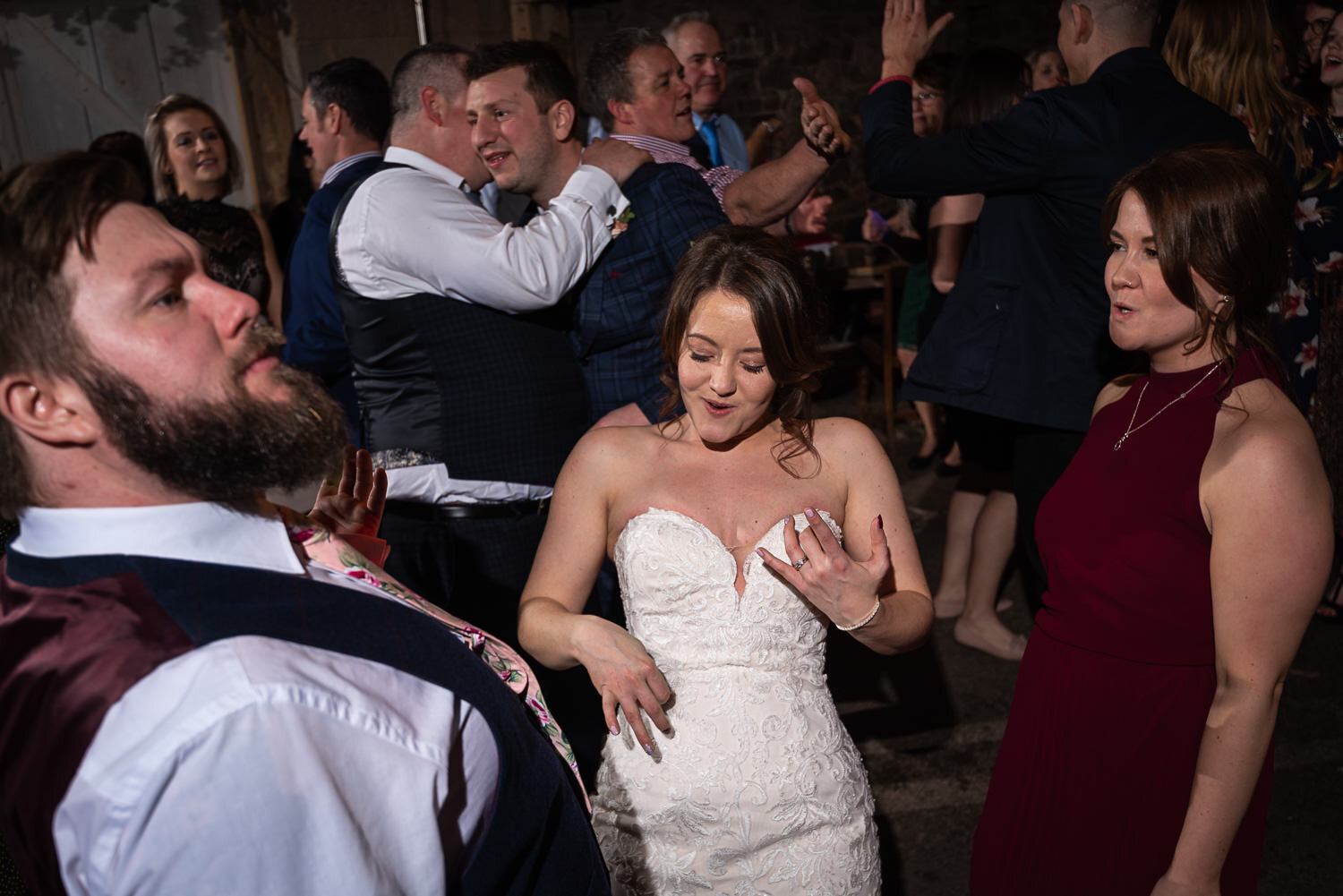 Air guitar playing at Lyde Court wedding
