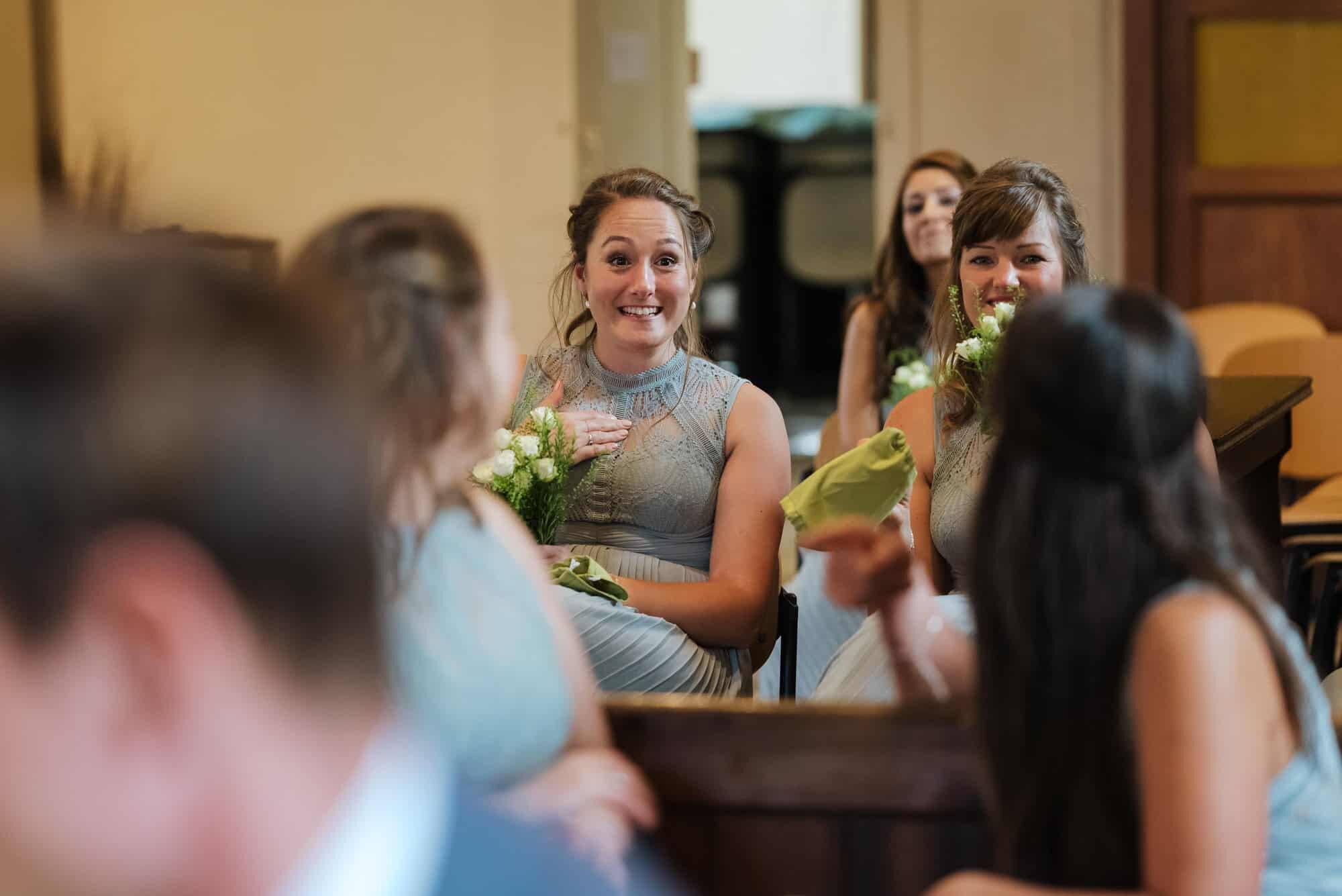 Wedding guests enjoying ceremony