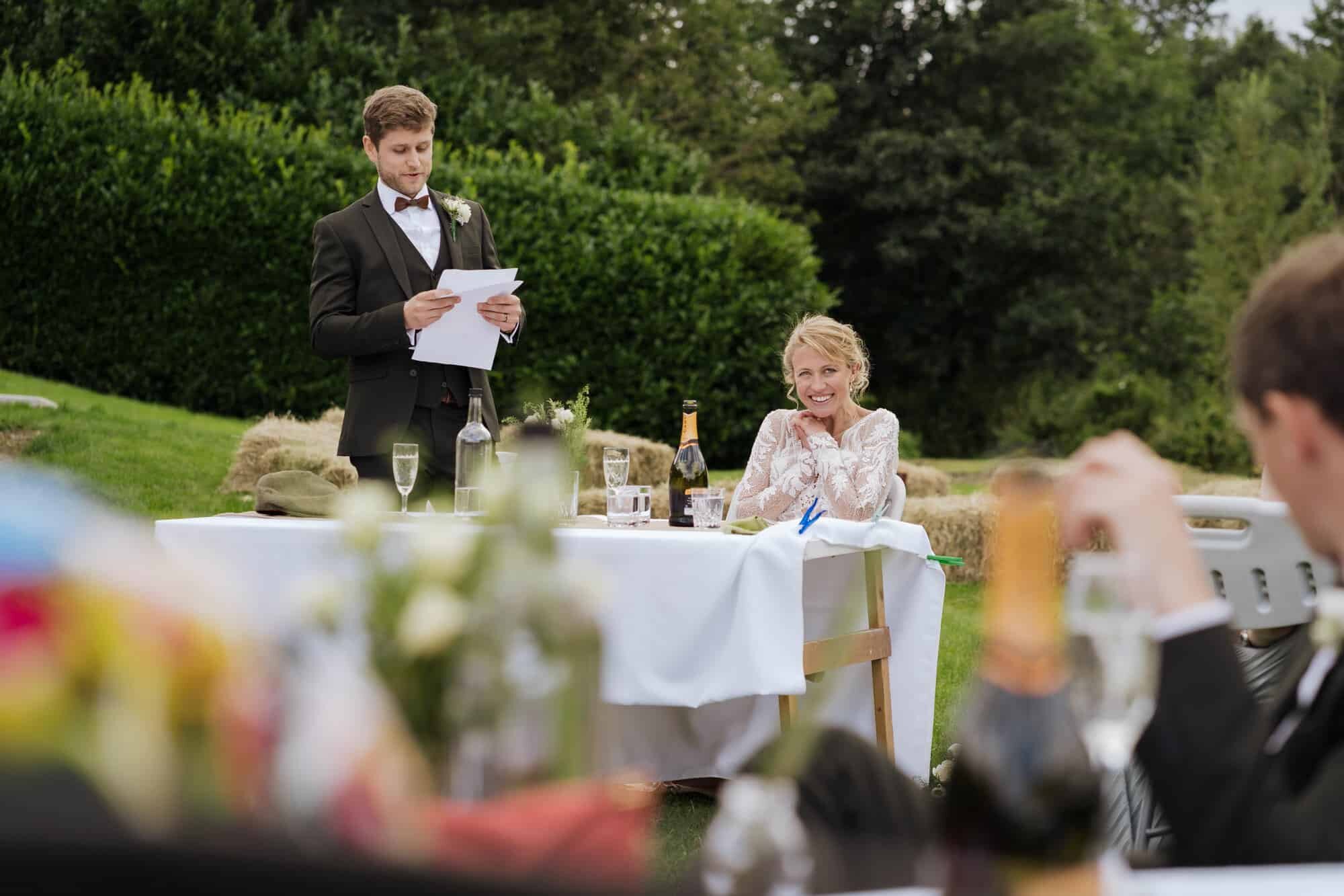Wedding speeches in garden wedding reception
