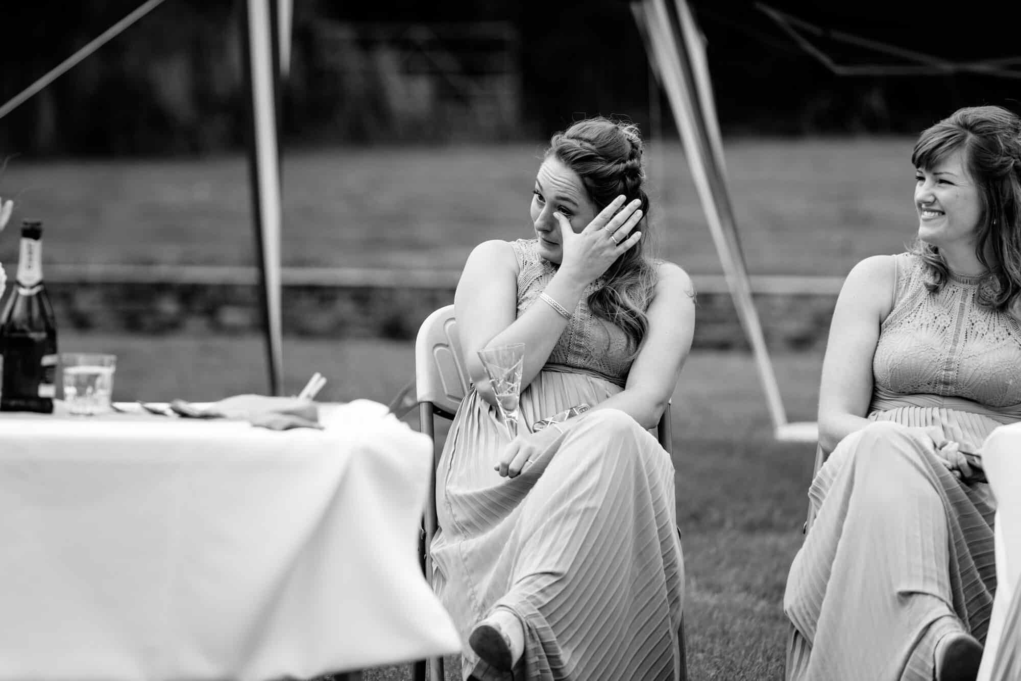 Bridesmaid crying with joy