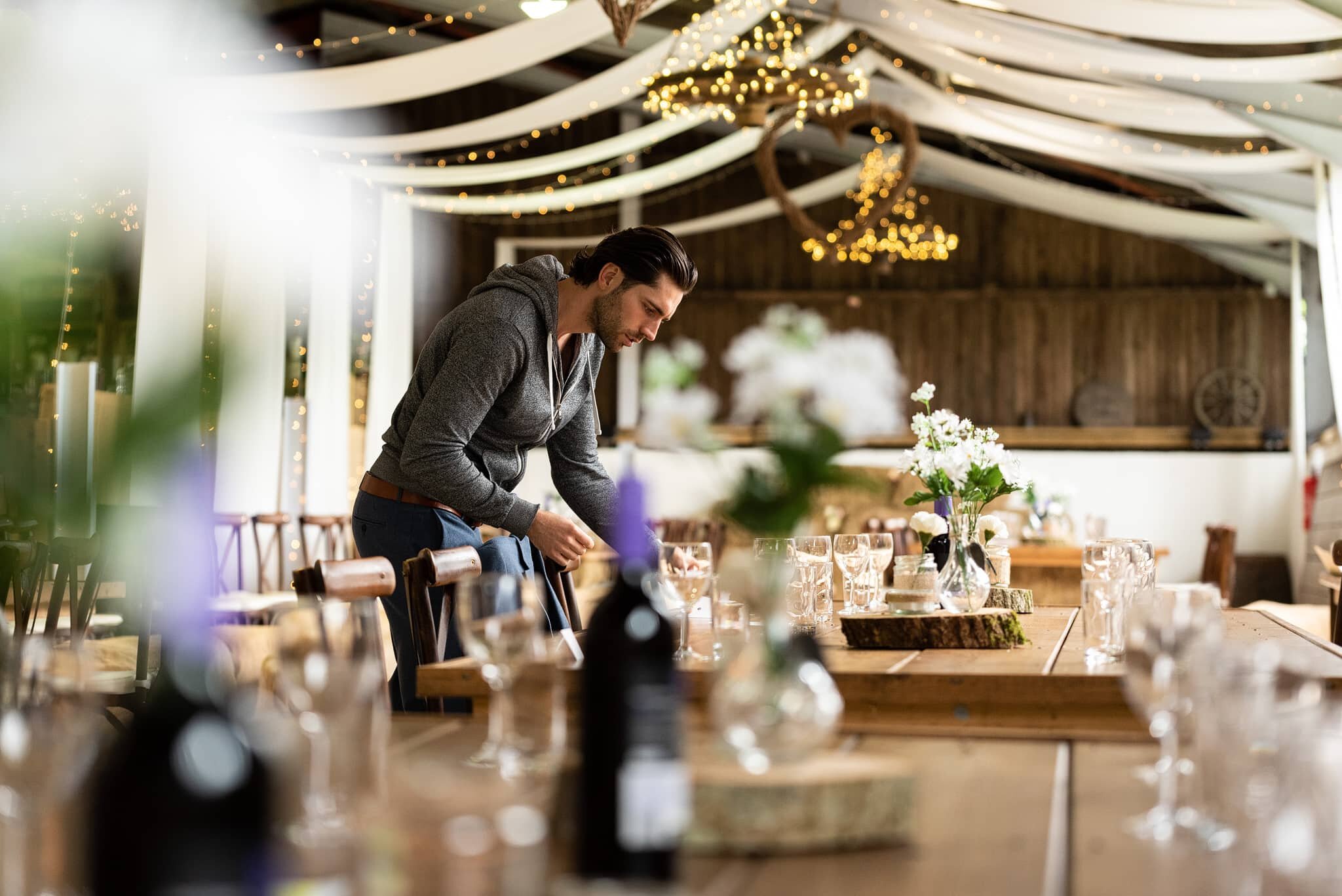 Groom preparing wedding venue