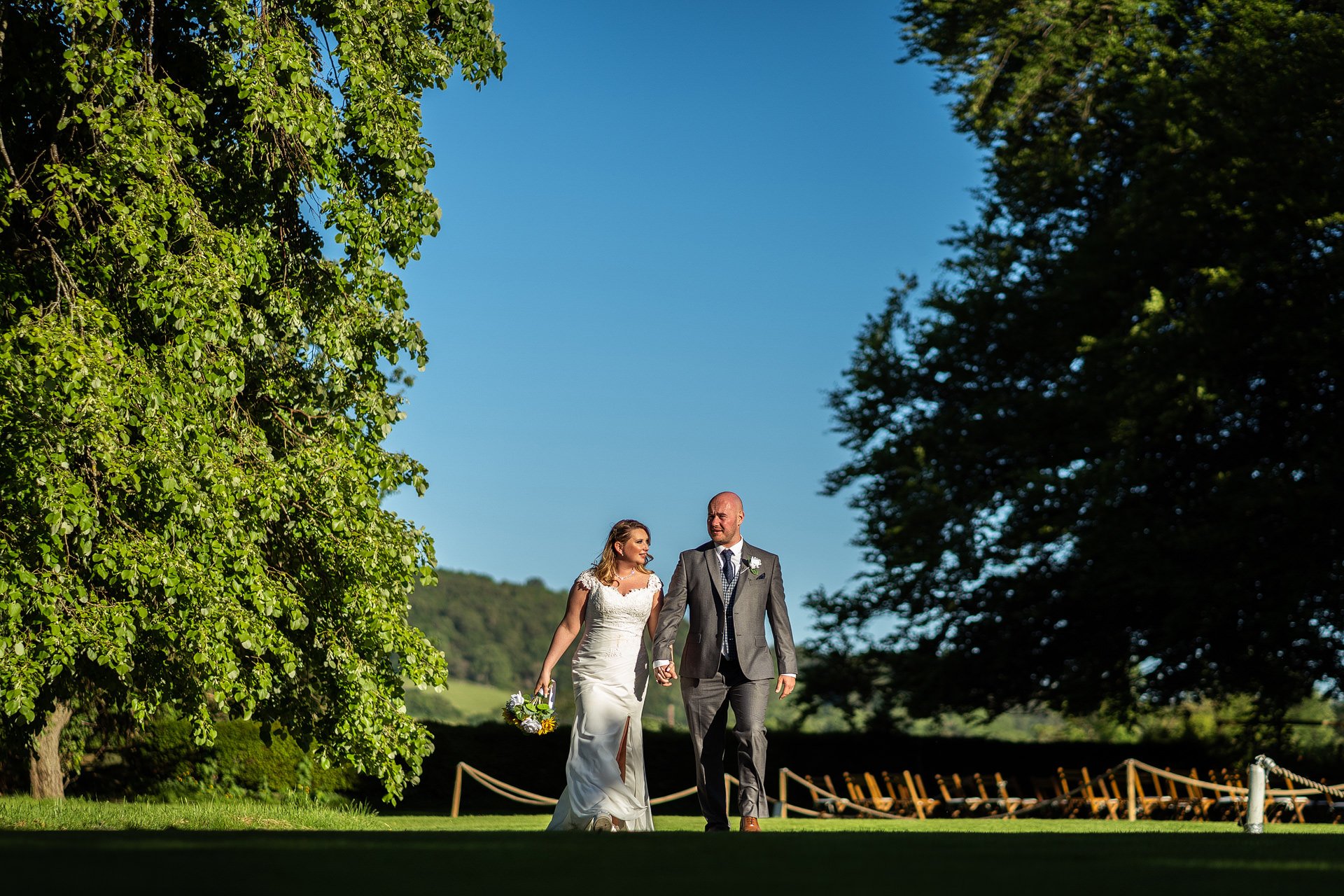 Bride &amp; Groom in sunshine at Tall Johns House