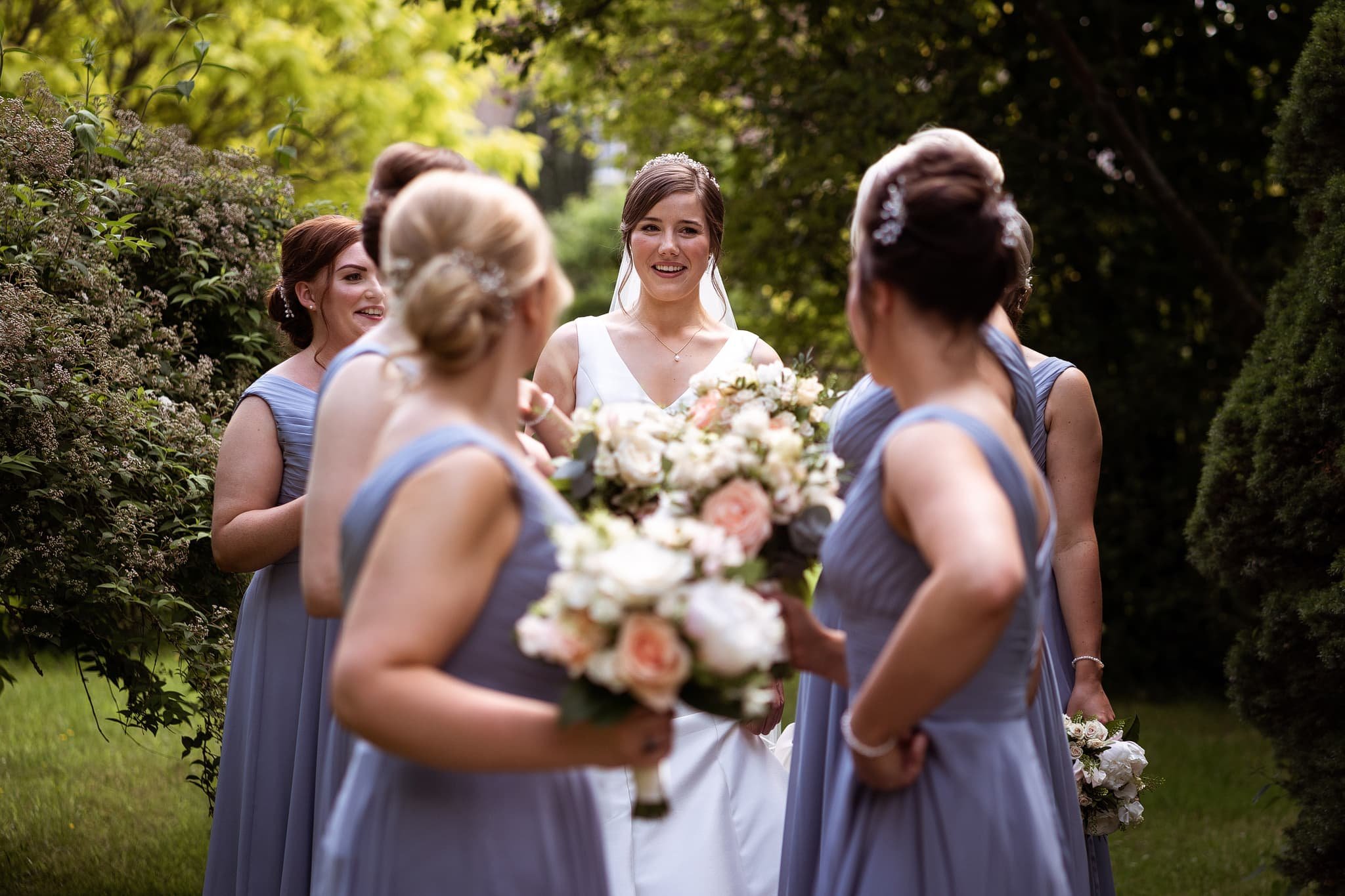 Bride and bridesmaids before Dewsall Court wedding
