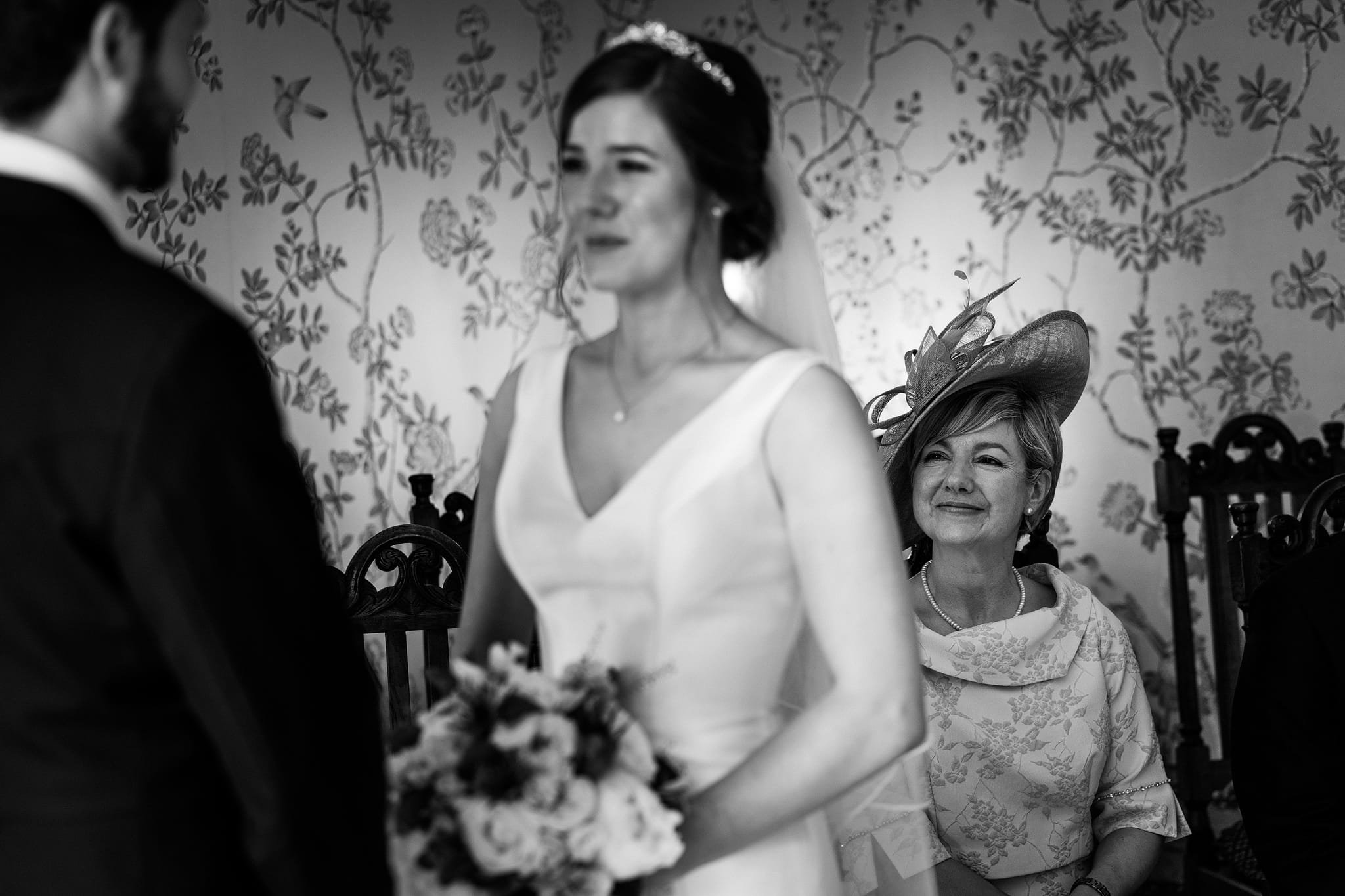 Proud mother of bride looking at daughter