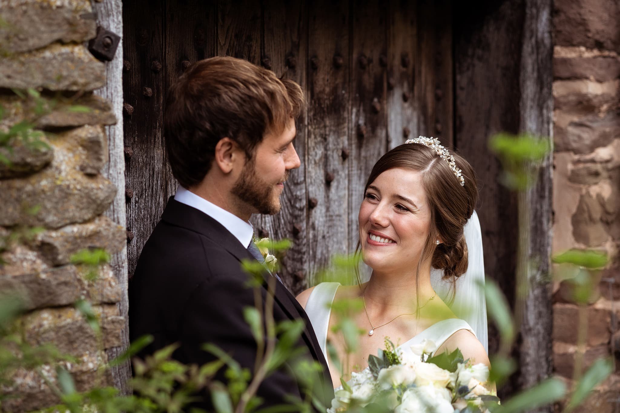 Bride &amp; groom portrait at Dewsall Court