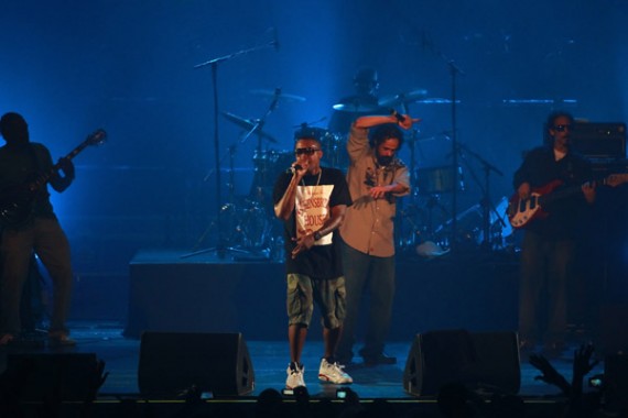 Rapper Nas rocks Varsity Red Air Jordan VI's on-stage in Paris, 2010