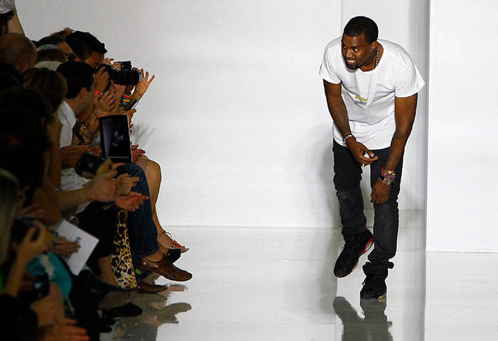 Kanye West wears "Black Infrared" Air Jordan VI's at Paris Fashion Week, 2011. 