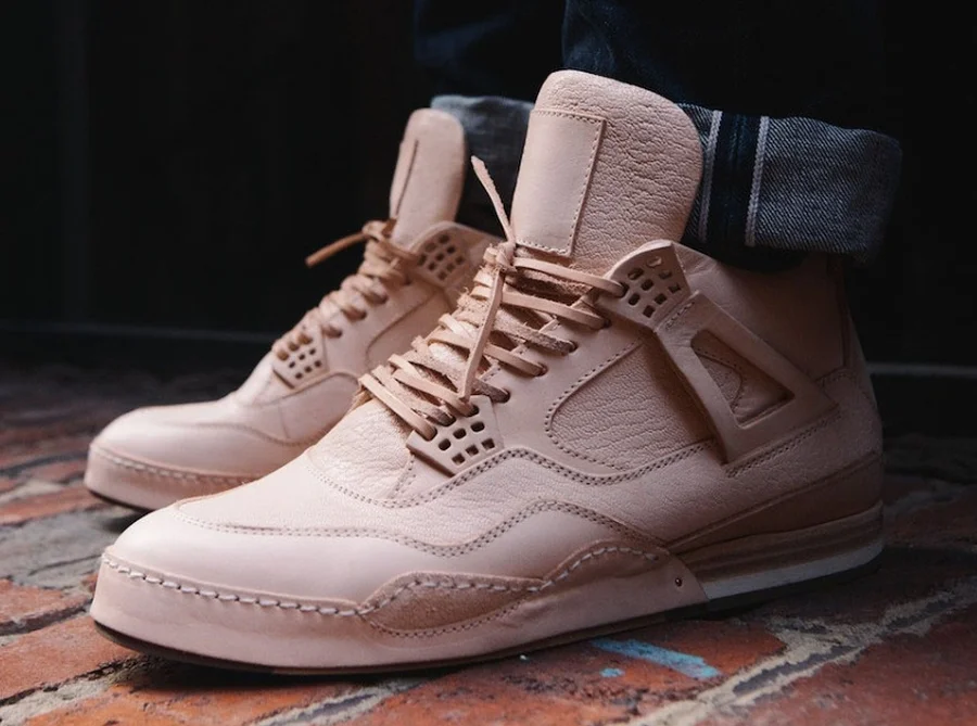 The Hender Scheme Manual Industrial Products "10" Sneaker, a hand-stitched luxury homage to Hatfield's Air Jordan IV design