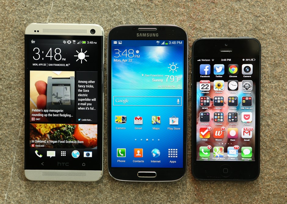 Left to right: the HTC One, Samsung Galaxy S4, and the Apple iPhone 5. (photo courtesy of CNET.com)
